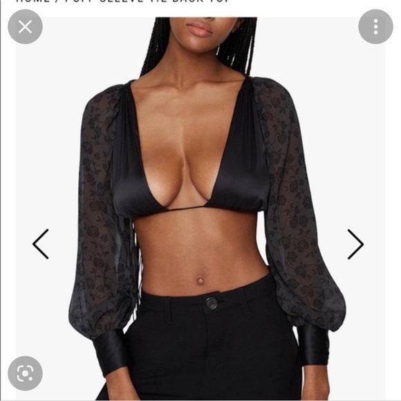 We wore what puff sleeve black tie top in XS - Picture 1 of 3